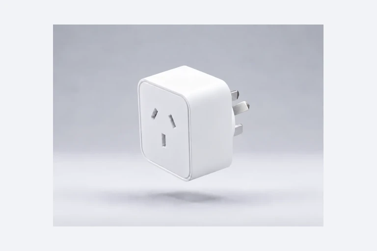 Angled view of a white smart plug with the socket upright